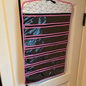 Chic Hanging Jewelry Organizer with Pink Trim